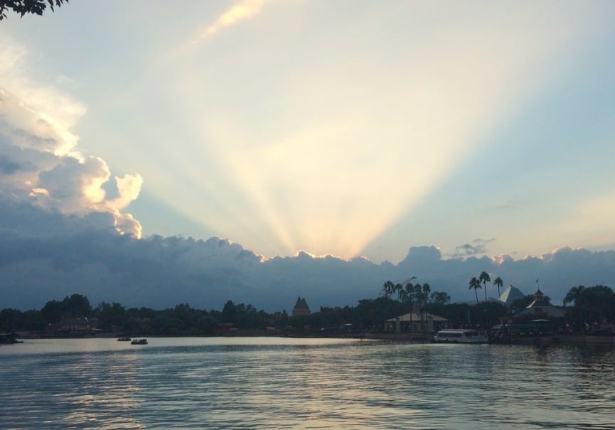 Things To Do At Epcot With Teens www.extraordinarychaos.com The Sun Setting behind the clouds at Epcot www.extraordinarychaos.com