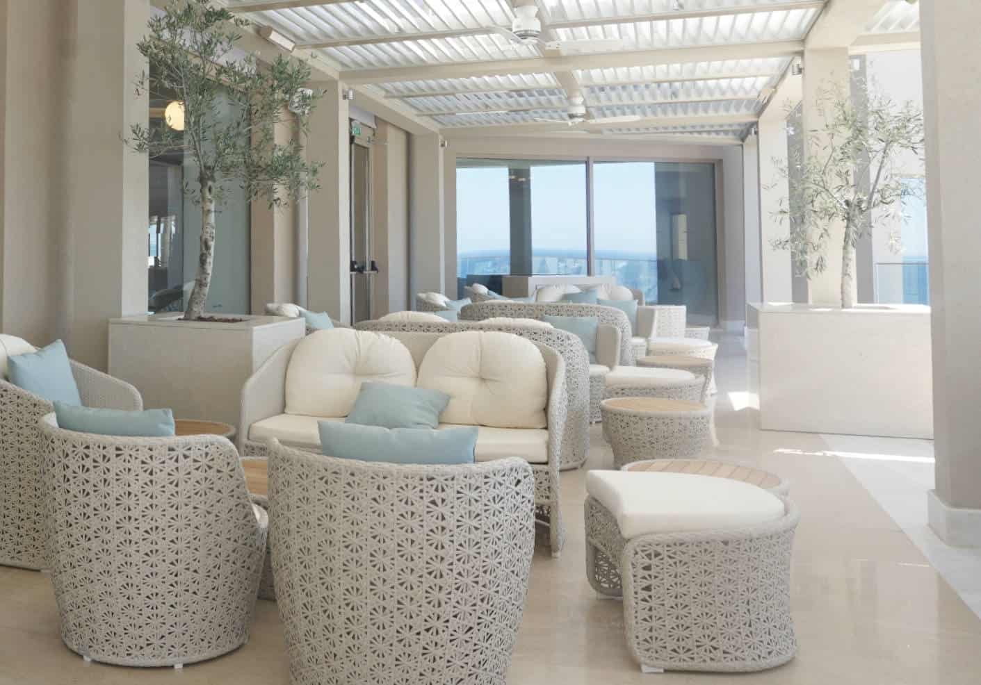 Patio overlooking the sea at Ikos Oceania