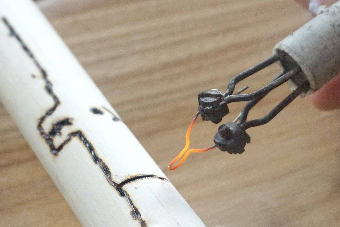 Stick carving at Down to Earth