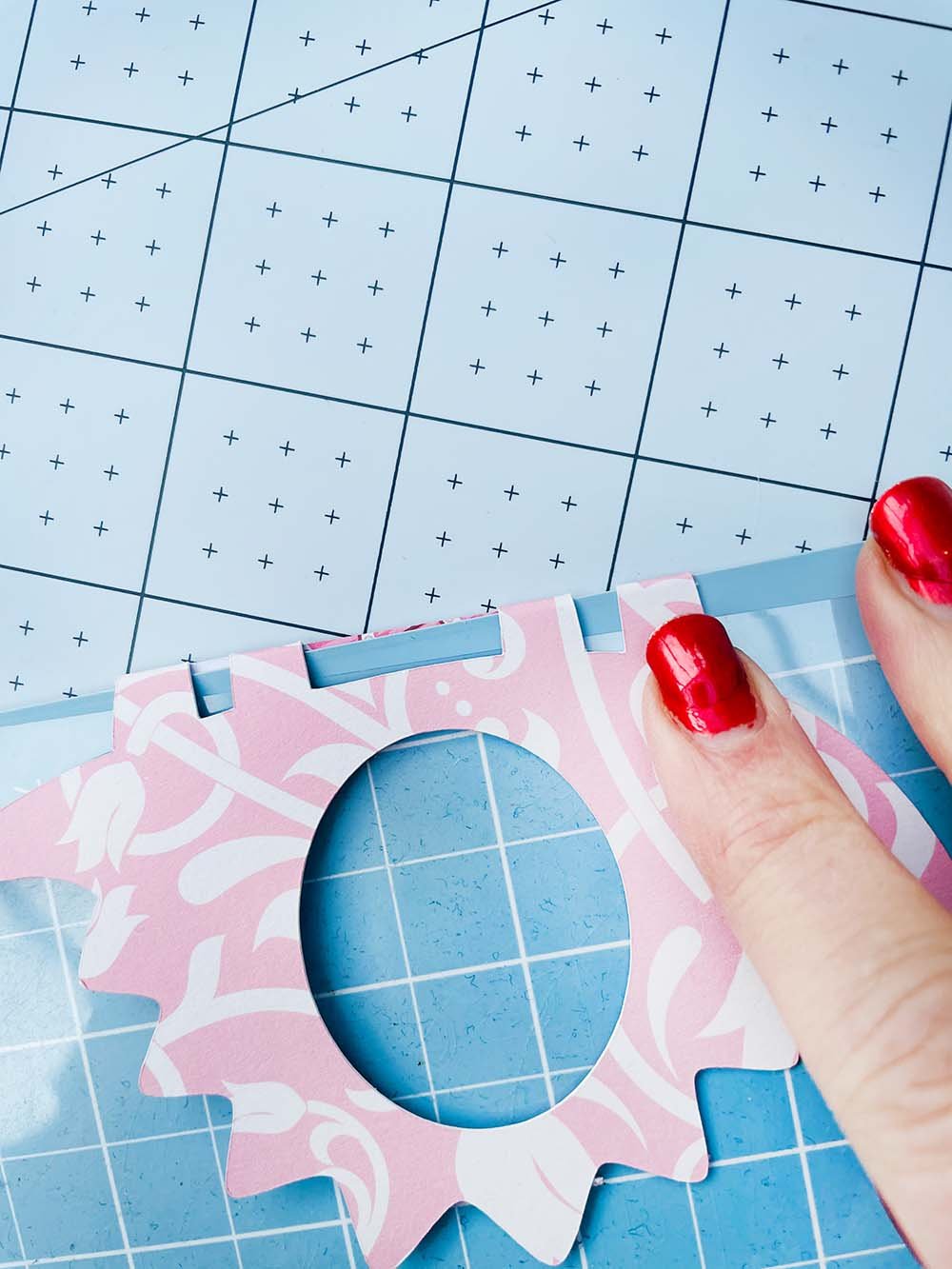 Bend the edges over a ruler to create a fold
