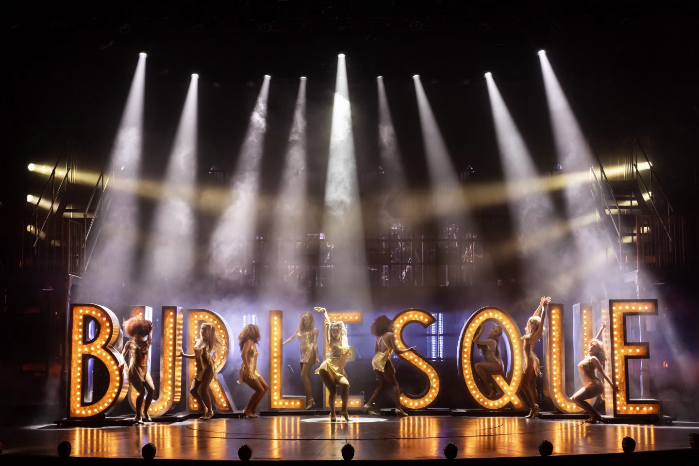 BURLESQUE by Antin, , BOOK WRITER / PRODUCER - Steven Antin, Music and Lyrics - CHRISTINA AGUILERA, Music and Lyrics - Sia, Music and Lyrics - DIANE WARREN; Music and Lyrics - TODRICK HALL, Music and Lyrics - JESS FOLLEY;
Director & Choreographer- NICK WINSTON,
Set Designer - Sutra Gilmour,
Costume Designer - RYAN DAWSON LAIGHT; Video Designer - NINA DUNN. Lighting Designer - Jack Knowles; Sound Designer - Ben Harrison, Manchester - 2024,