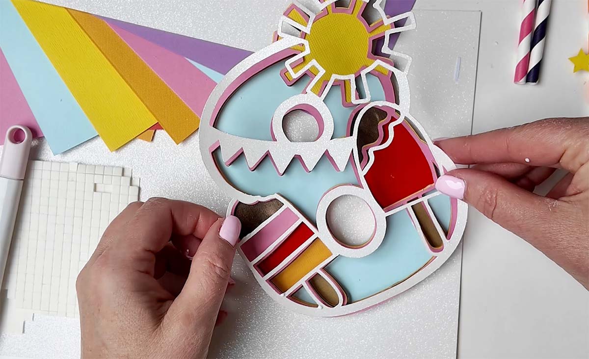 Build up the layers of your diy ice cream layered cake topper